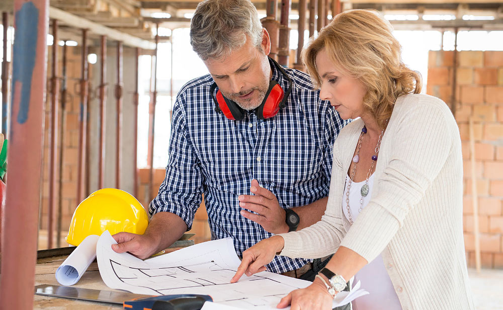 People Discussing Construction Plans